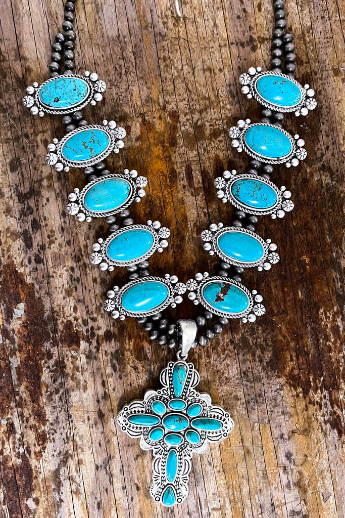 Lot - JEWELRY: Silver squash blossom necklace, no maker's marks viewed,  traditional design of horseshoe pendant, ten squash blossoms, and seventeen  natural free-form inset turquoise stones, beads, blossoms and medallions  al...
